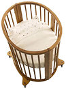 Ліжечка, манежі дитячі Stokke