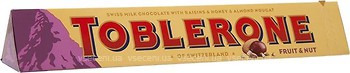 Фото Toblerone молочний з родзинками, медом і мигдальною нугою 100 г